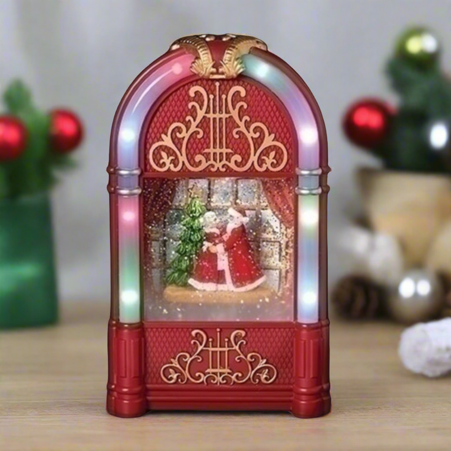 Roman Lighted Swirl Juke Box Dancing Santa and Mrs. Claus, 9.75-inch Height, Plastic