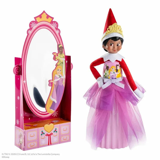Elf on the Shelf Disney Princess set featuring a doll dressed as Cinderella with a red and purple tulle gown, white collar, and gold crown, shown next to a matching pink vanity mirror box with Disney Princess artwork.