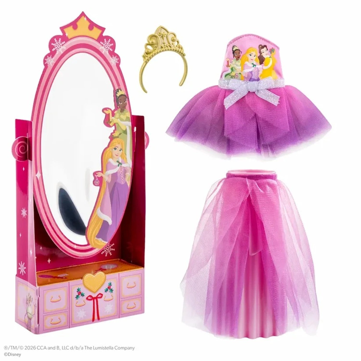 Disney Princess dollhouse playset featuring a pink vanity mirror with a drawer base, a purple and pink tutu dress, a gold tiara, and a matching headband, all on a white background.