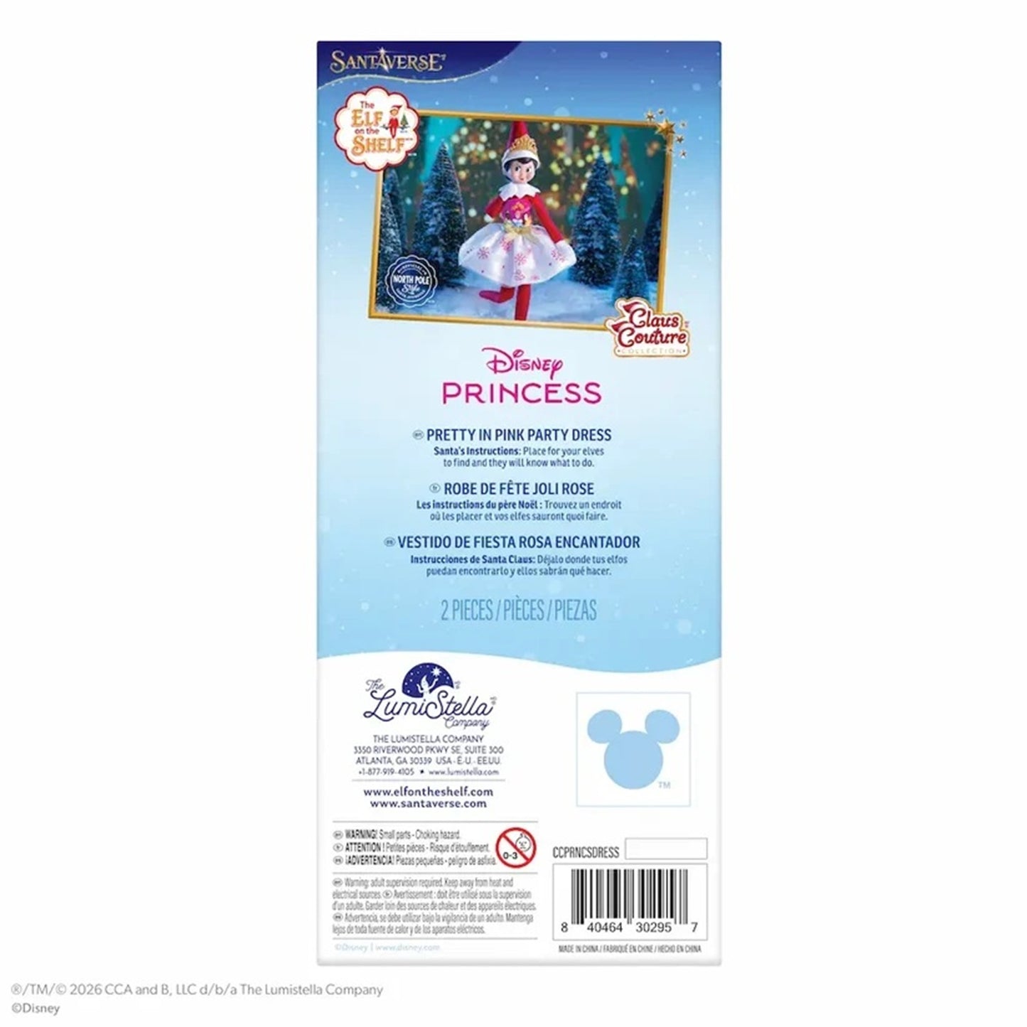 The back of a Santa Clásia Disney Princess Pretty in Pink Party Excess toy package, showing product details, a small elf illustration, Disney Princess branding, and a barcode on a white and light blue background.