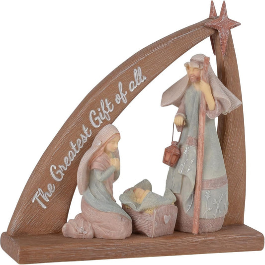 Wooden nativity scene figurine with Mary, Joseph, baby Jesus in a manger, and a star, on a white background. The arch reads 'The Greatest Gift of all.