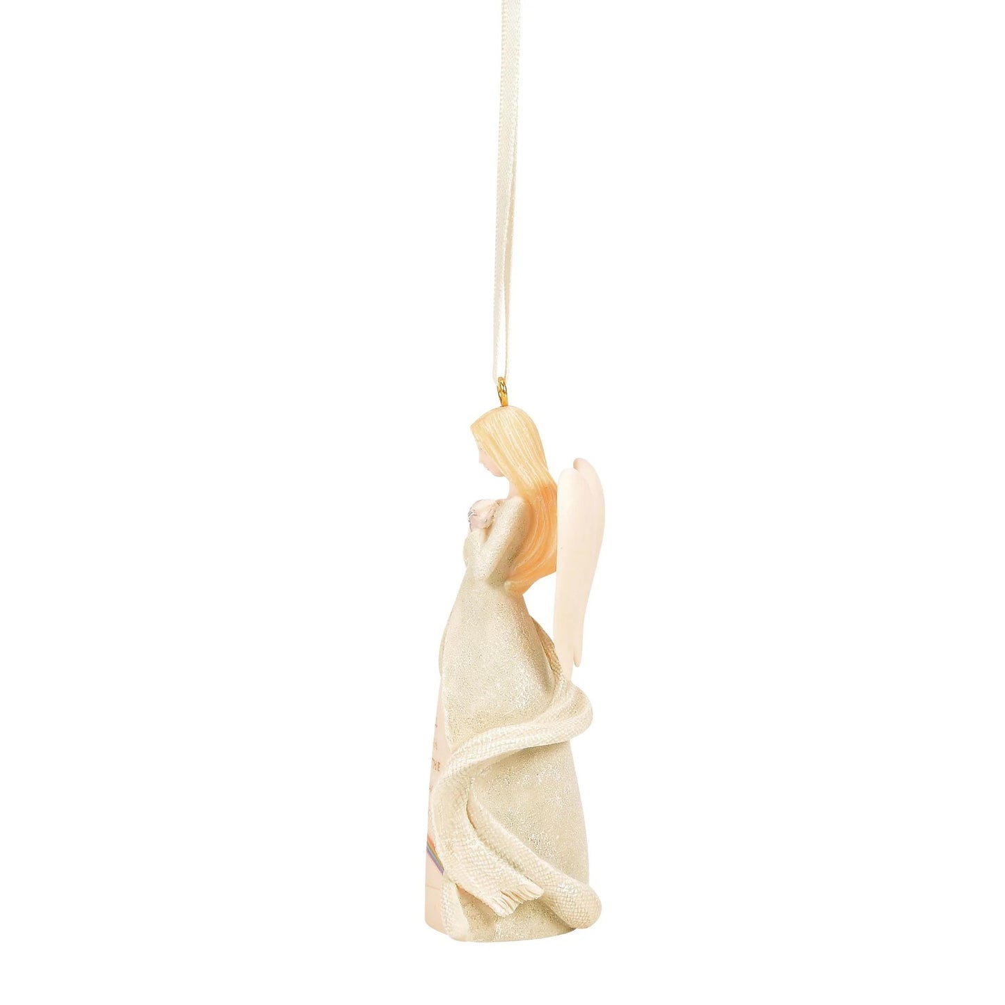 An angel Christmas ornament featuring a female angel in a flowing cream gown with gold hair and wings, suspended by a cream ribbon on a white background.