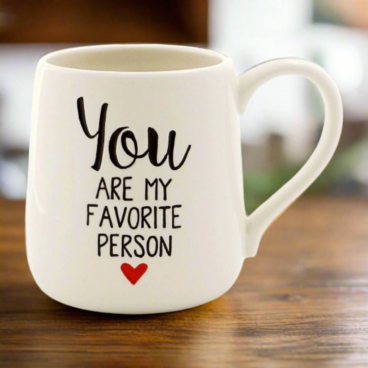 Whether it’s from a friend or lover, it’s always nice to hear when you’re someone’s favorite person. This heartfelt 16 oz. stoneware coffee mug from Our Name is Mud is a beautiful anniversary, Valentine’s Day, or just because gift for a special person.
Mug
4 in H