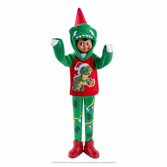 Toy figure in a green dinosaur costume with red hat and red shirt on a white background