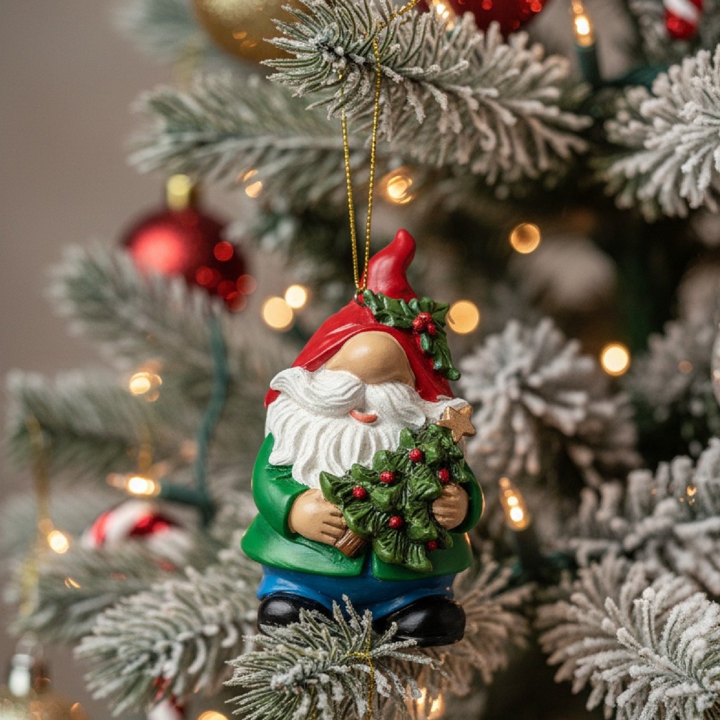 Gnome Holding a Christmas Tree Ornament by Roman