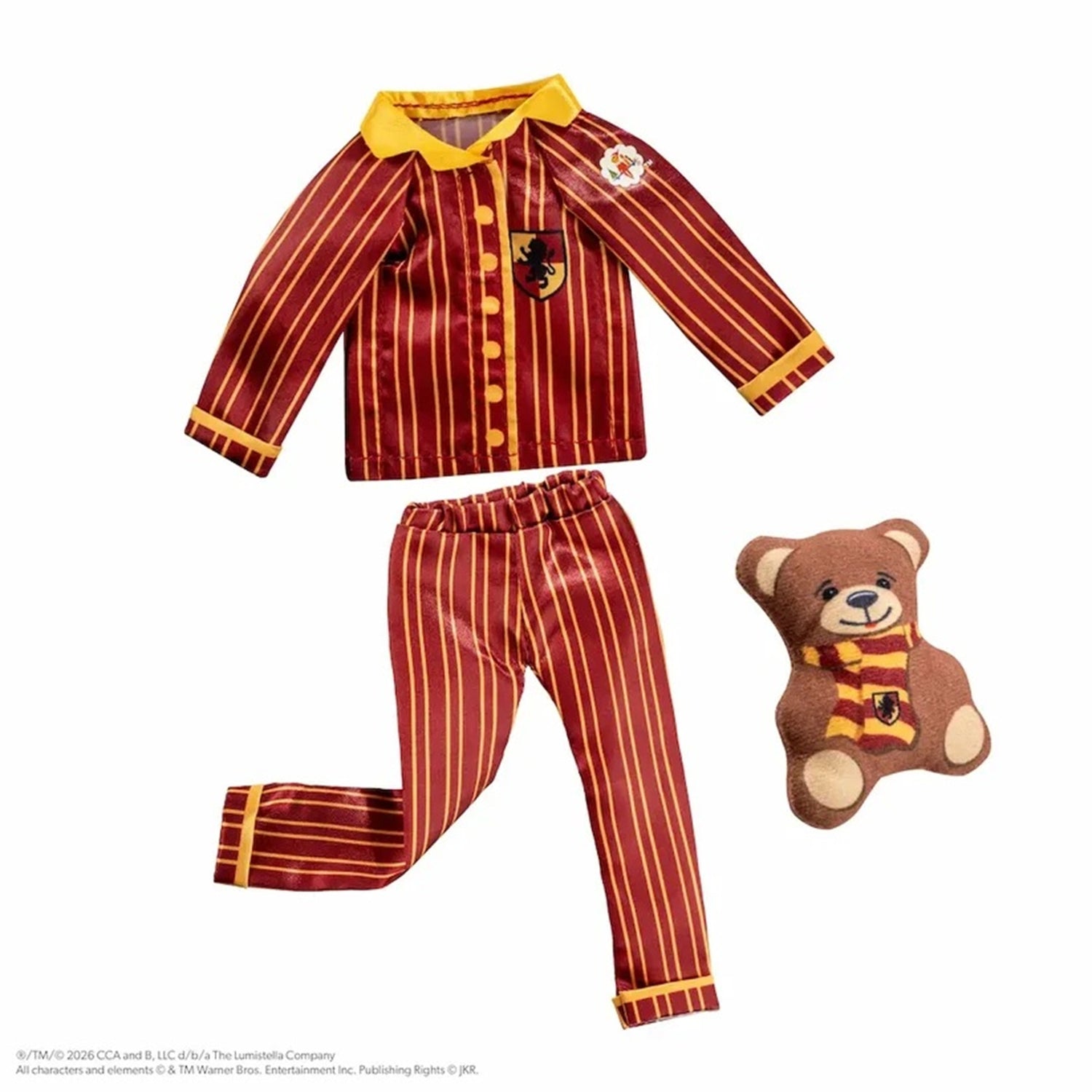 A children's Gryffindor-themed pajama set consisting of a long-sleeve button-front top and matching pants in red and gold vertical stripes, shown with a small brown teddy bear wearing a matching striped scarf on a plain white background.