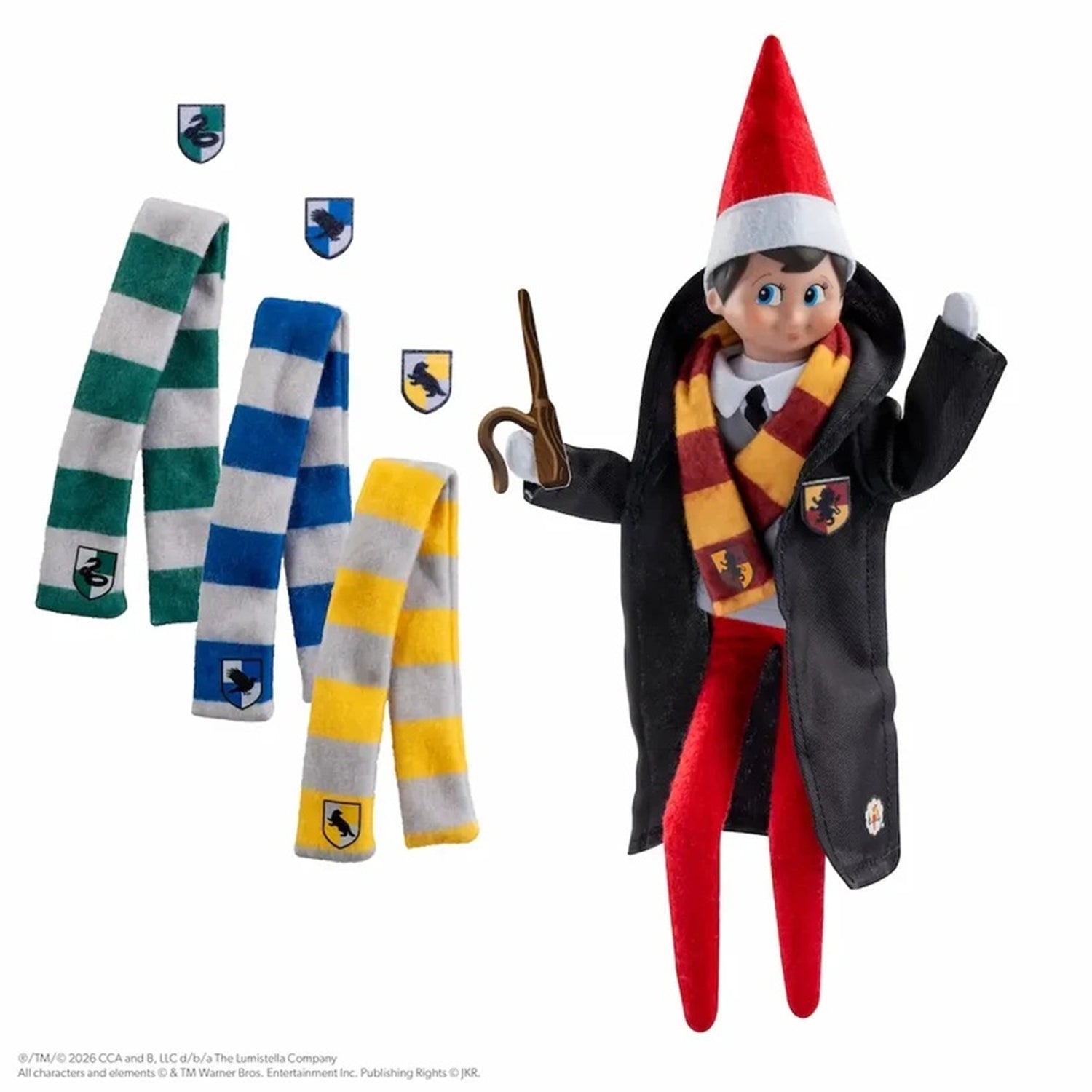 Elf on a Shelf Harry Potter wand set featuring a Harry Potter doll in a black robe with a red, yellow, and white striped scarf, shown alongside four matching scarves with house crests on a white background.