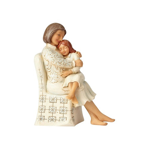Femme assise avec un enfant 