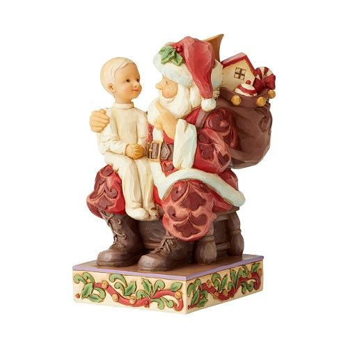 Père Noël avec un enfant sur les genoux Post du samedi soir par Jim Shore 