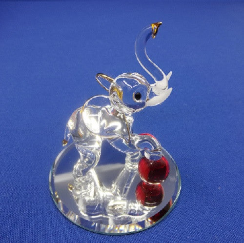 Glass Baron Elephant with Ball Figurine - Ria's Hallmark & Jewelry Boutique